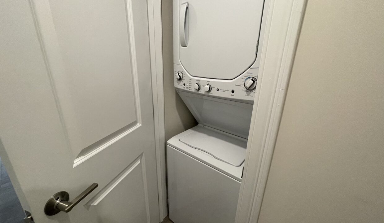 a washer and dryer in a small room.