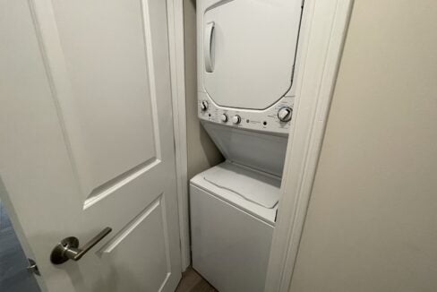 a washer and dryer in a small room.