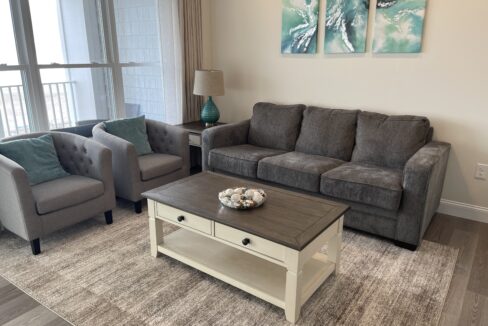 a living room with two couches and a coffee table.