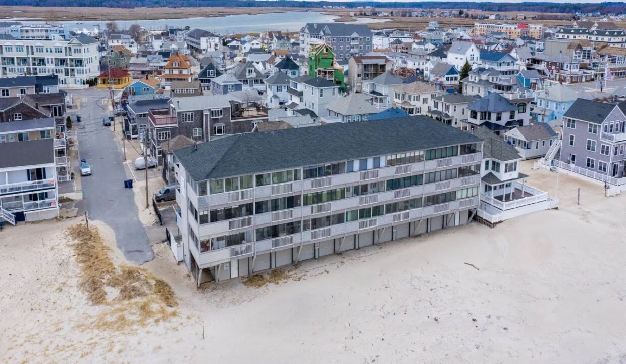 an aerial view of a beach front town.