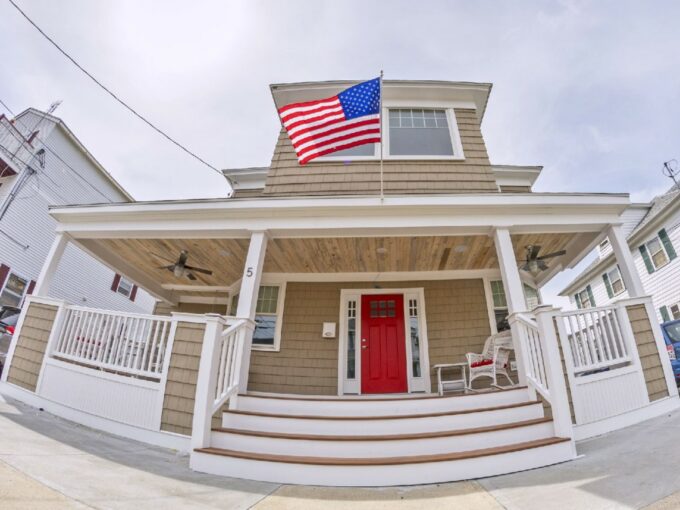 a house with a flag on the front porch.