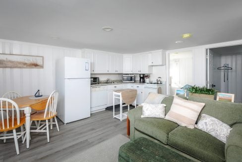 Bright, modern kitchen with an adjoining living area.