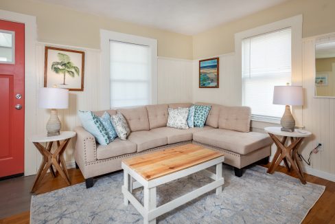 a living room with a couch and a coffee table.