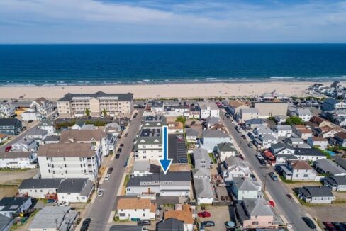 an aerial view of a beach front town.