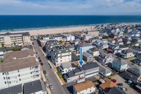 an aerial view of a beach front neighborhood.