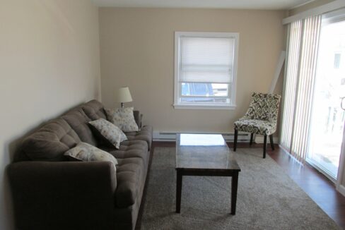 a living room with a couch and a coffee table.