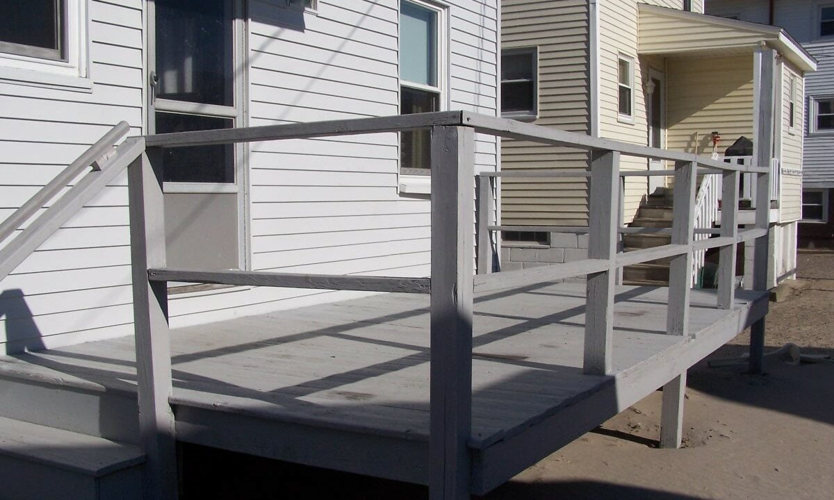 a set of stairs leading up to a house.