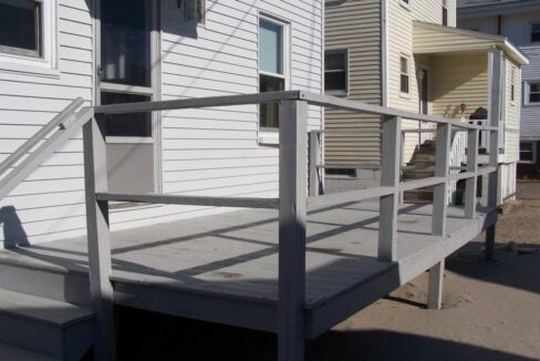 a set of stairs leading up to a house.