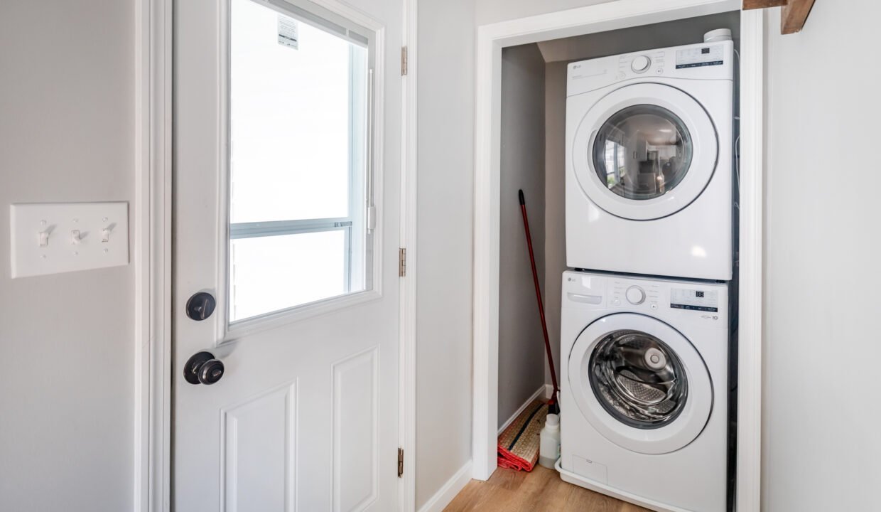 A laundry room with a washer and dryer.