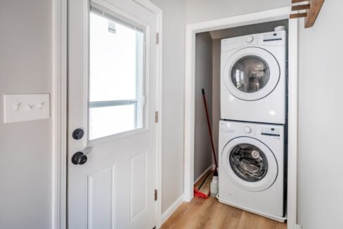 A laundry room with a washer and dryer.