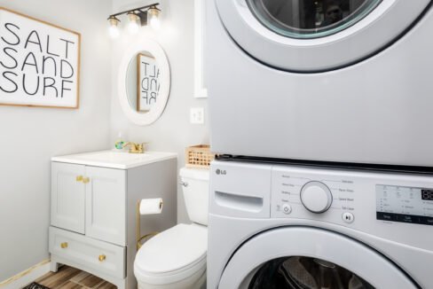 A laundry room with a washer and dryer.