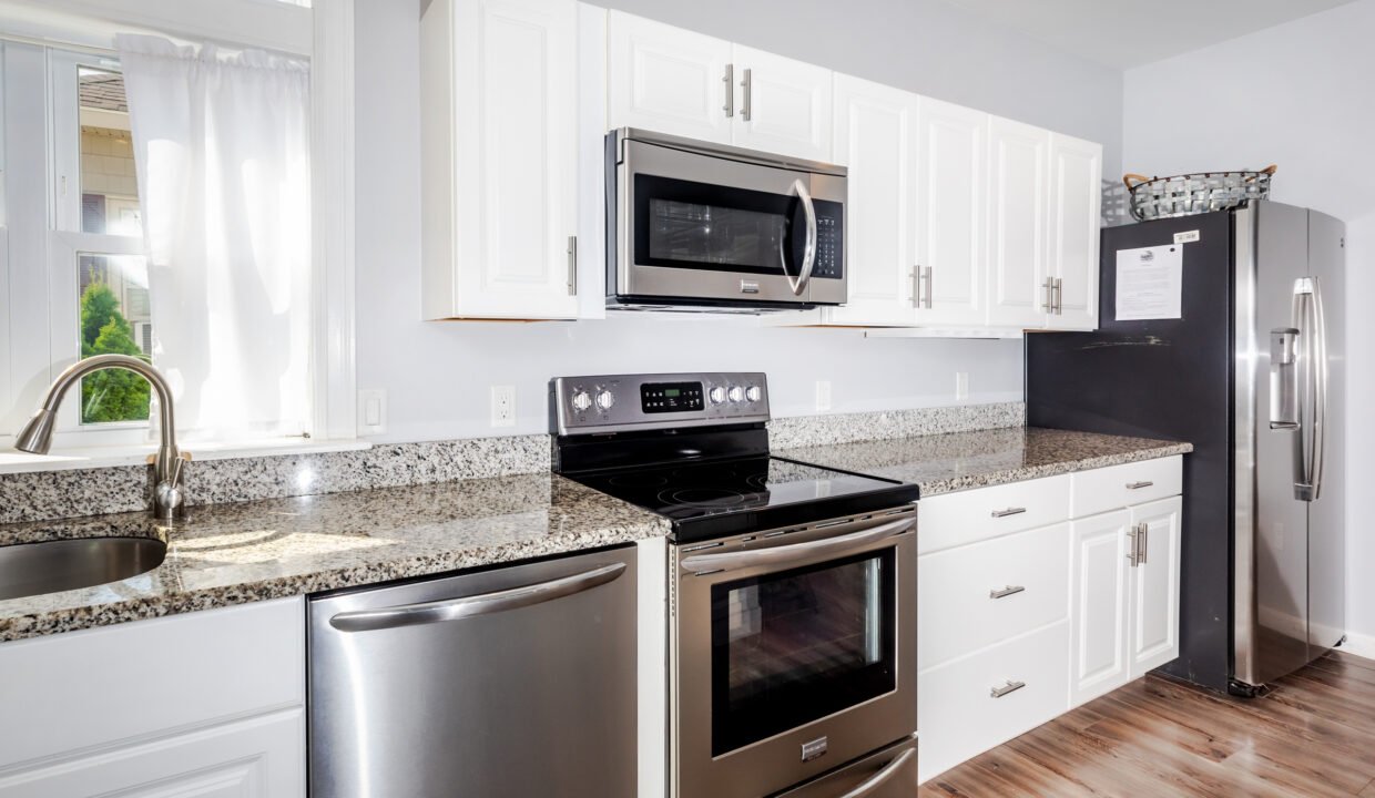 A kitchen with stainless steel appliances.