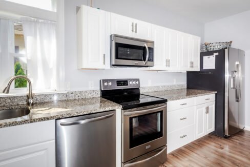 A kitchen with stainless steel appliances.