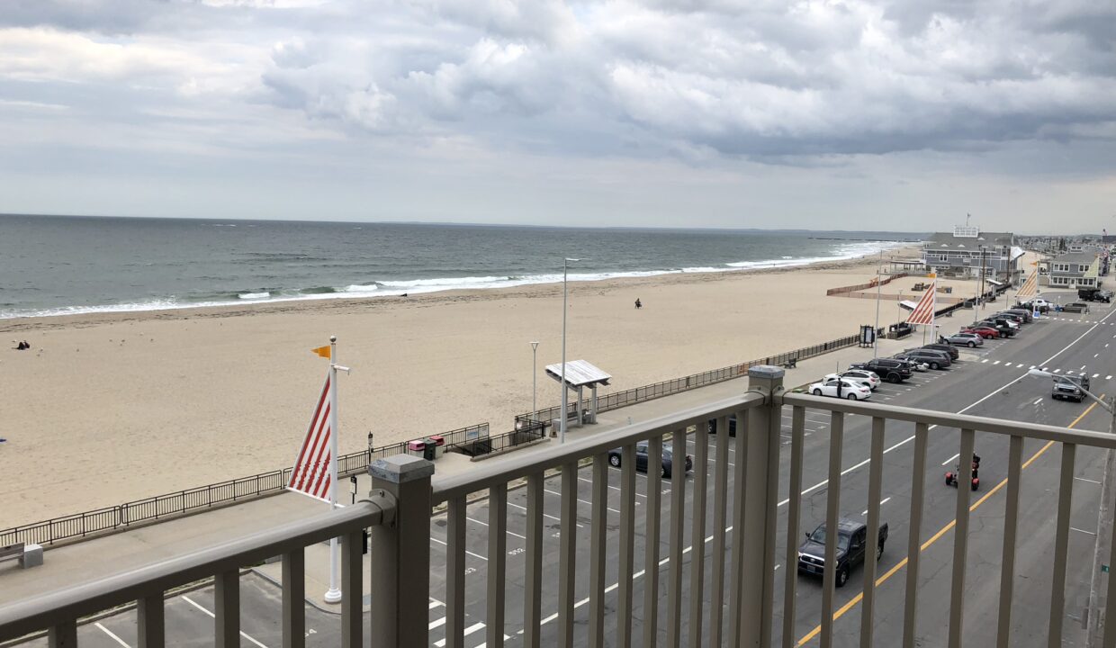 a view of a beach from a balcony.