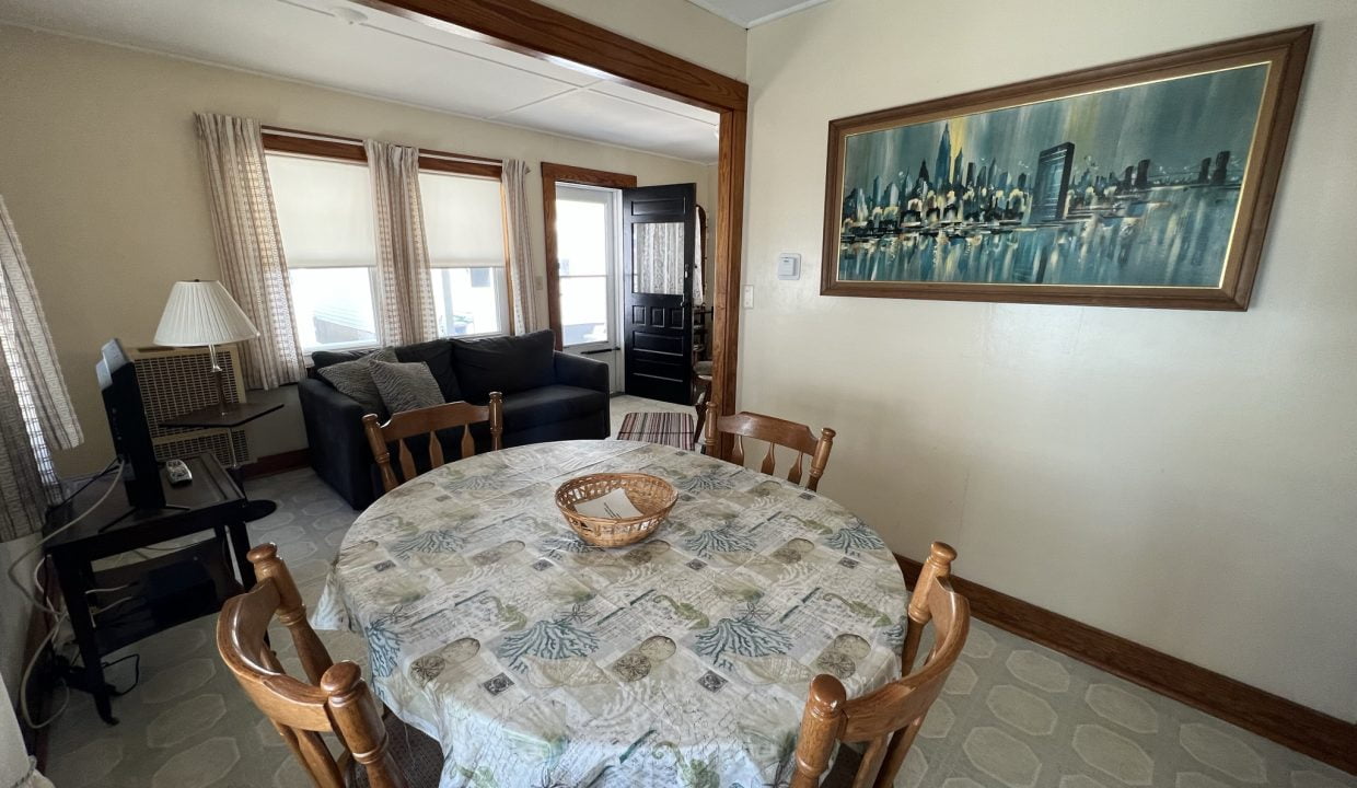 a living room with a couch and a table.