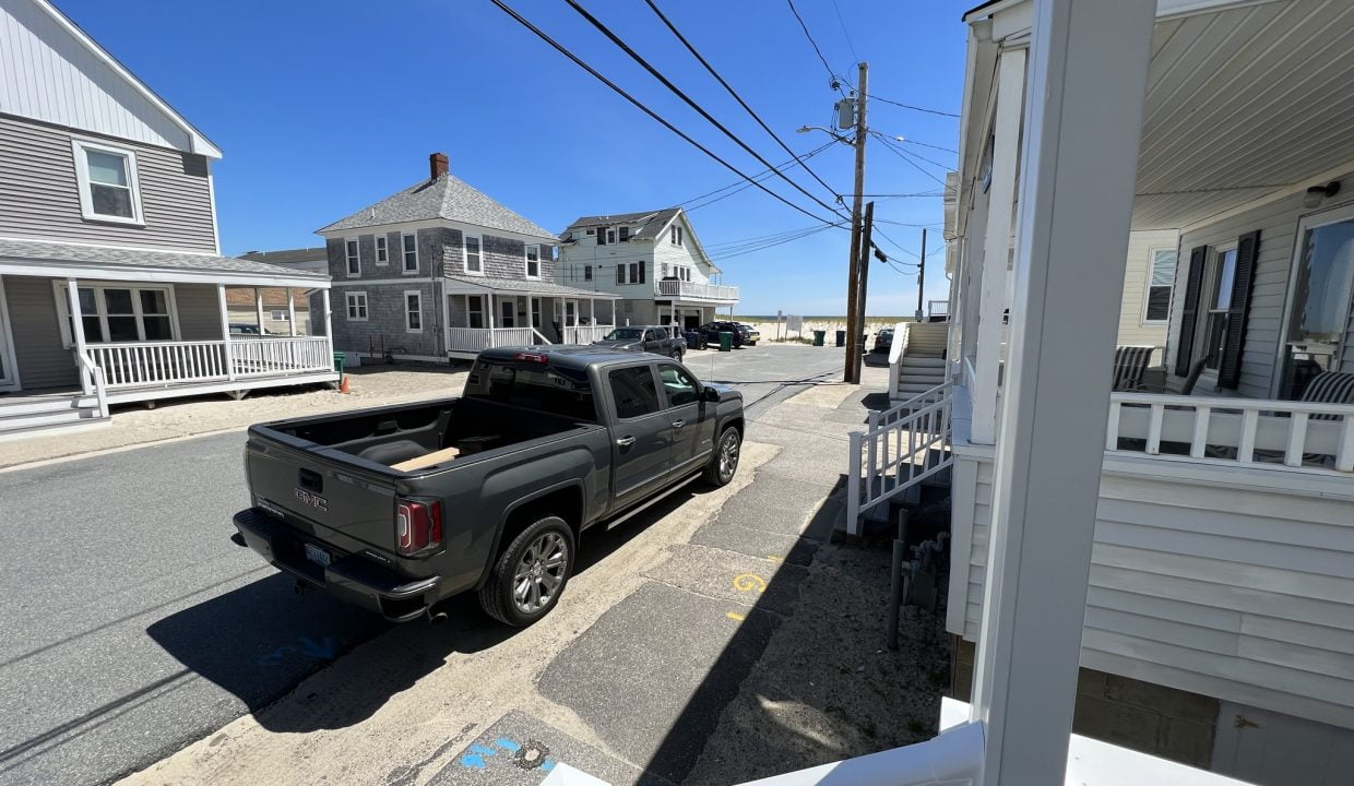 a truck is parked on the side of the road.