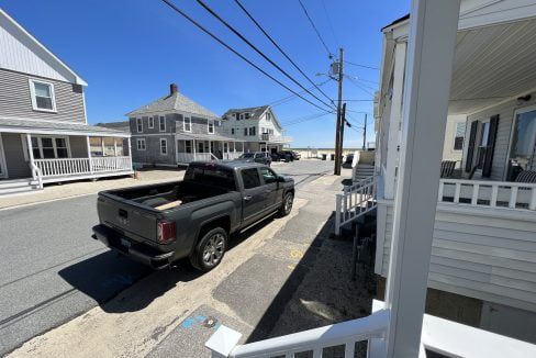 a truck is parked on the side of the road.