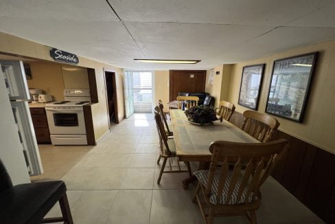 a kitchen with a table and chairs in it.