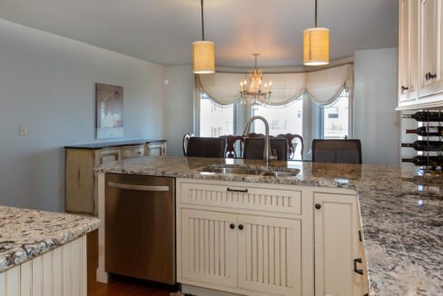 a kitchen with a sink and a dishwasher.