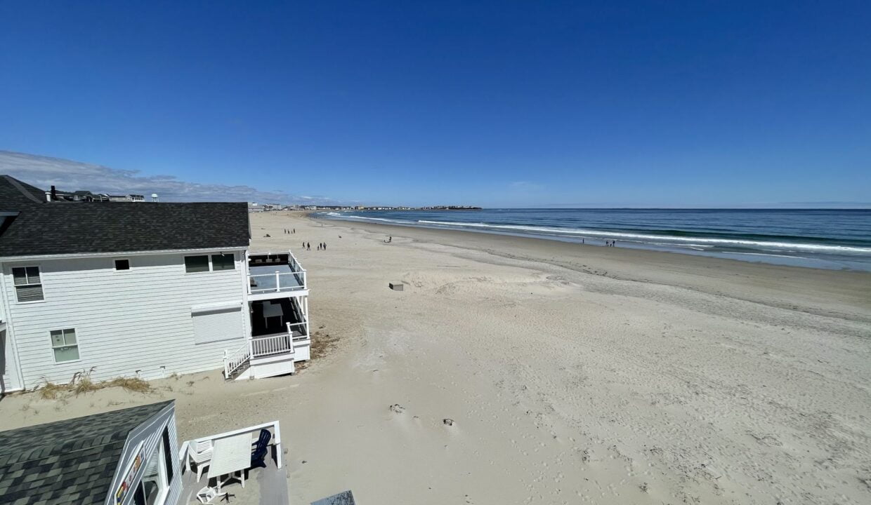 a view of a beach from a balcony.