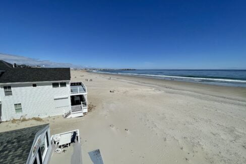 a view of a beach from a balcony.