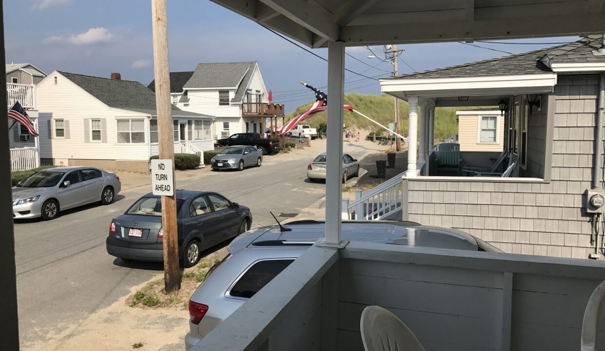 a car is parked on the side of the road.