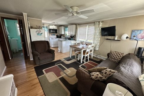 a living room with a couch and a table.