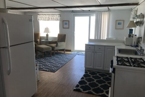 a white refrigerator freezer sitting inside of a kitchen.