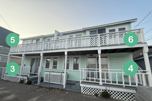 A two-story mint green house with a white railing and four stairways, each marked with numbered green circles: 3 and 4 below, 5 and 6 above.