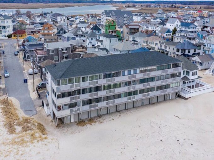 an aerial view of a beach front town.