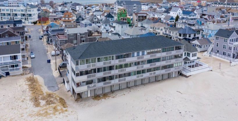 an aerial view of a beach front town.