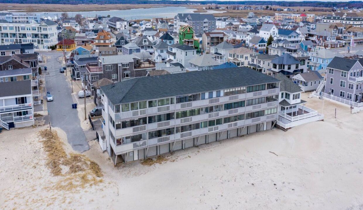 an aerial view of a beach front town.