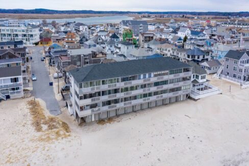 an aerial view of a beach front town.