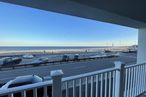 a view of a parking lot from a balcony.