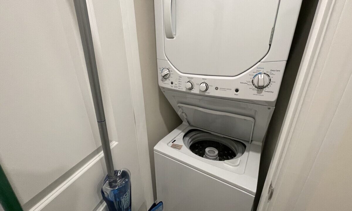 a washer and dryer in a small room.