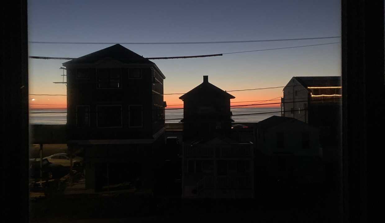 a view of a sunset through a window.
