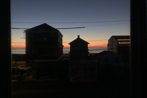a view of a sunset through a window.