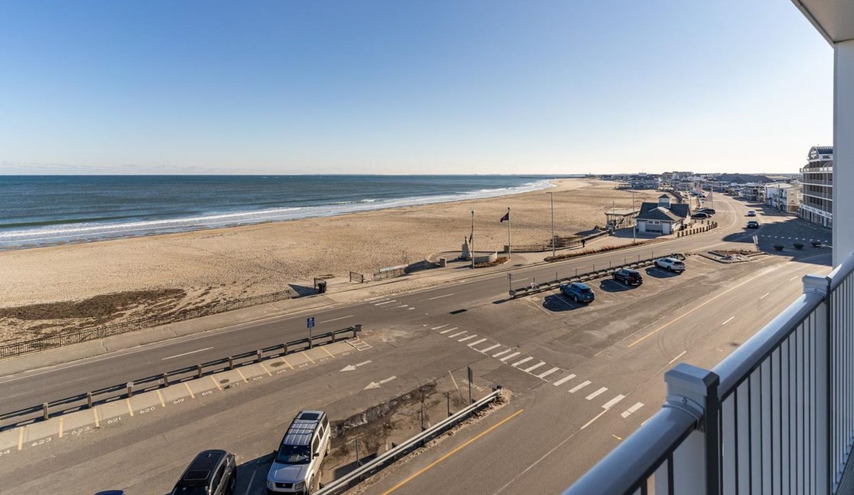 a view of a beach from a balcony.