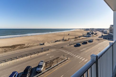 a view of a beach from a balcony.