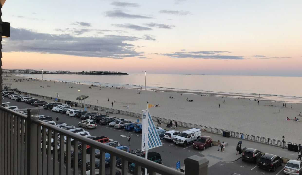 a view of a beach from a balcony.