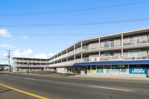 an empty street in front of a building.