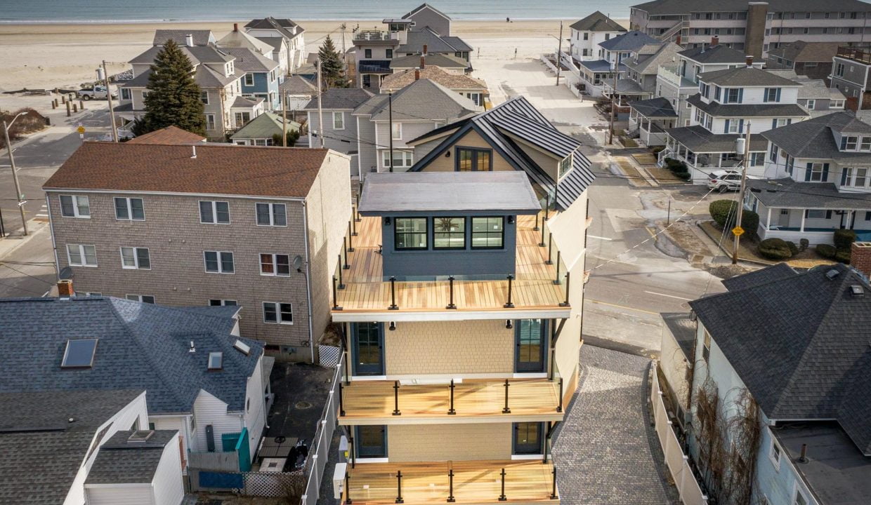 an aerial view of a beach front town.