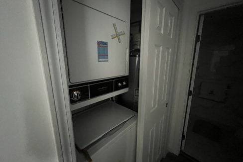 a washer and dryer in a small room.