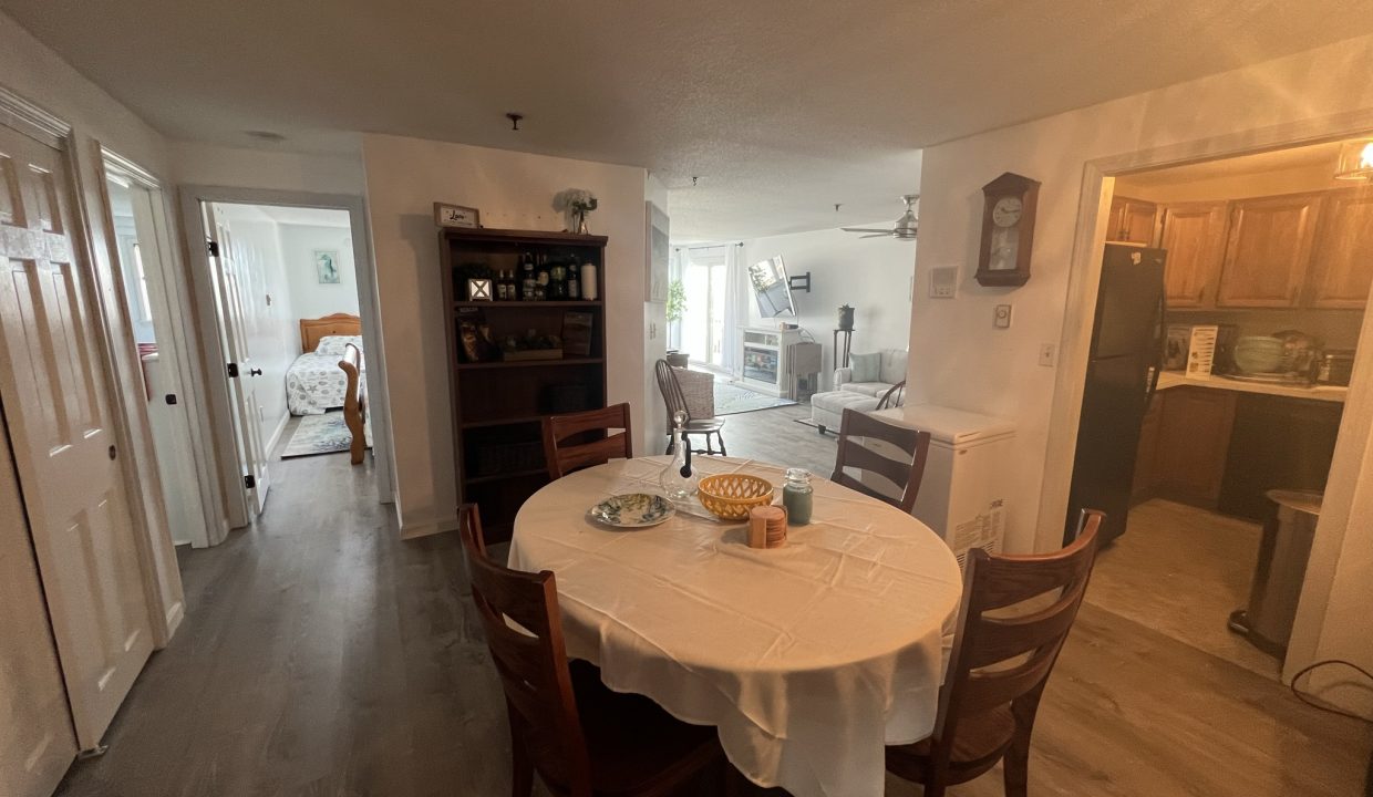 a dining room table with a bowl of food on it.
