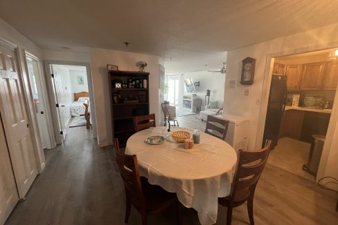 a dining room table with a bowl of food on it.