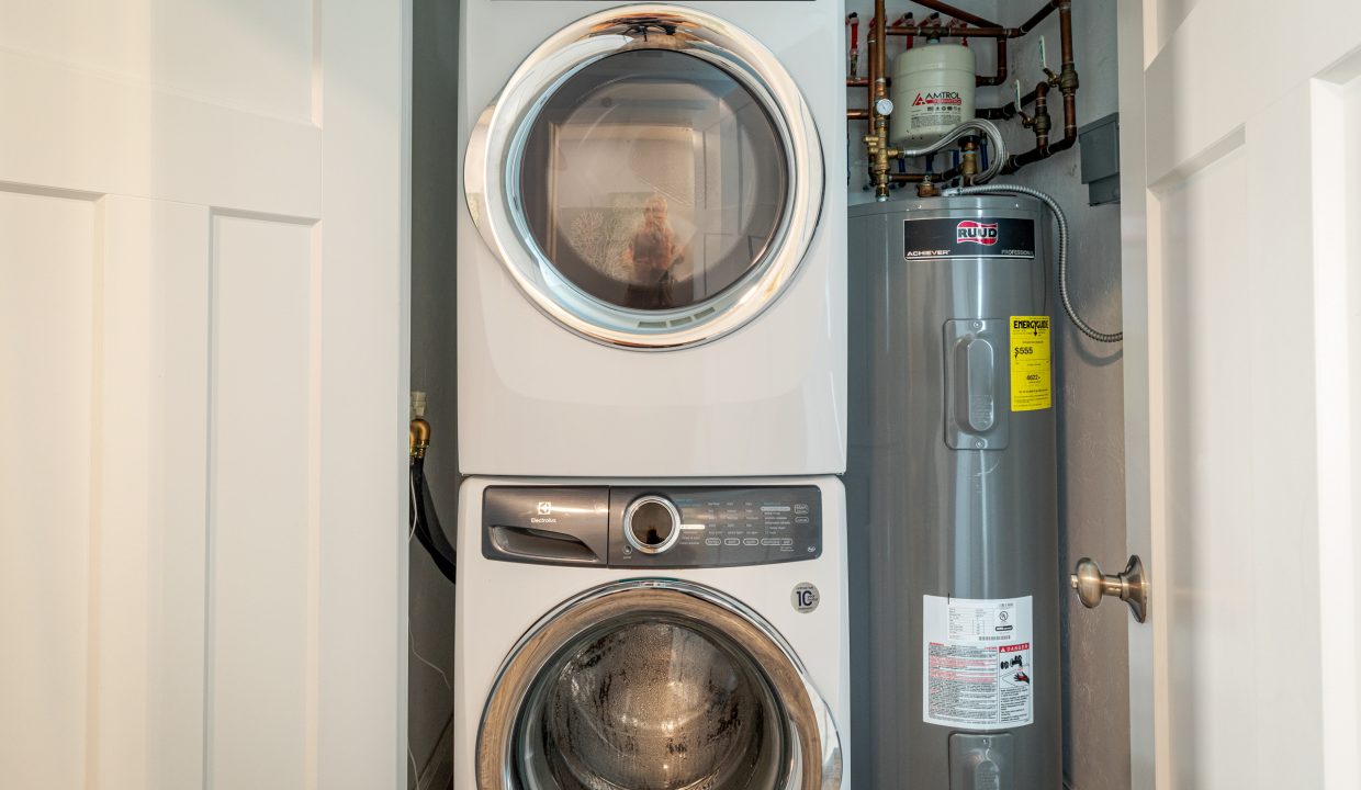 a washer and dryer in a small room.