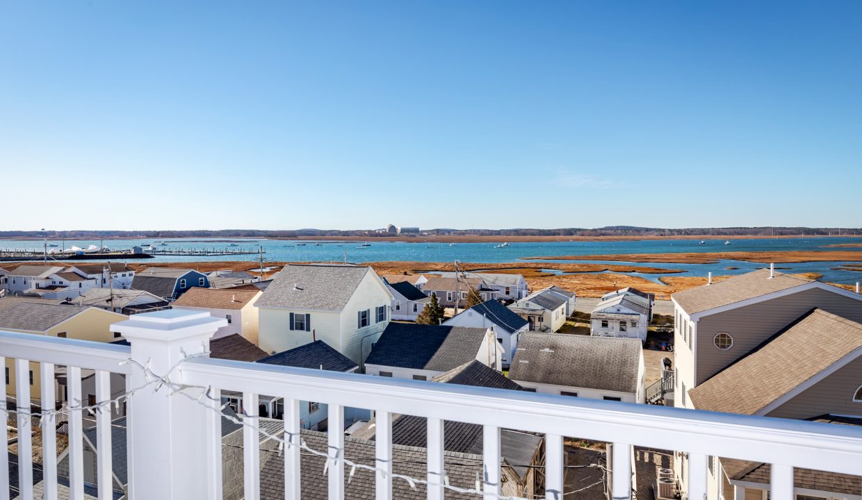 a view of the ocean from a balcony.