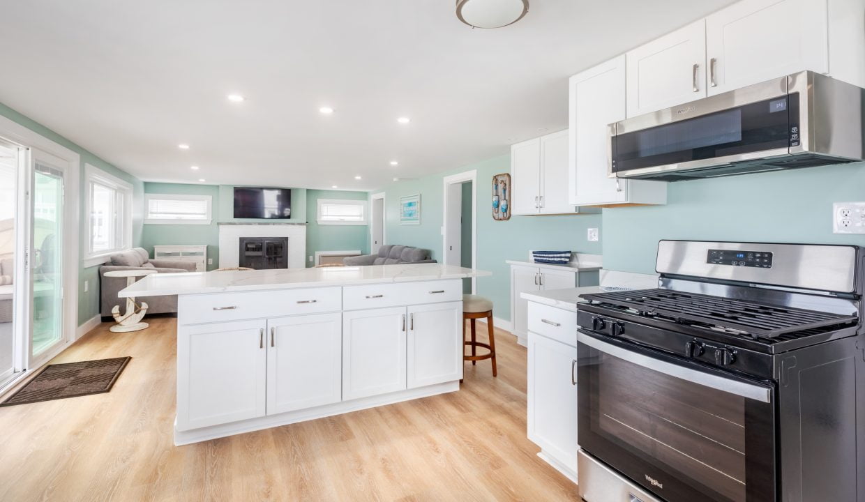 a kitchen with a stove and refrigerator.