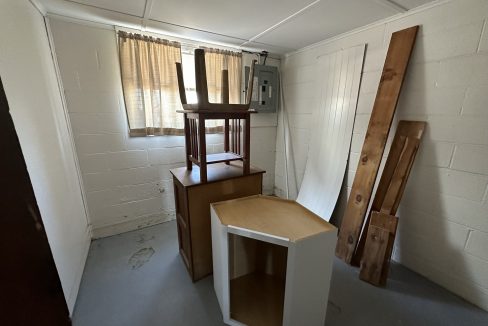 a room that has a bunch of furniture in it.