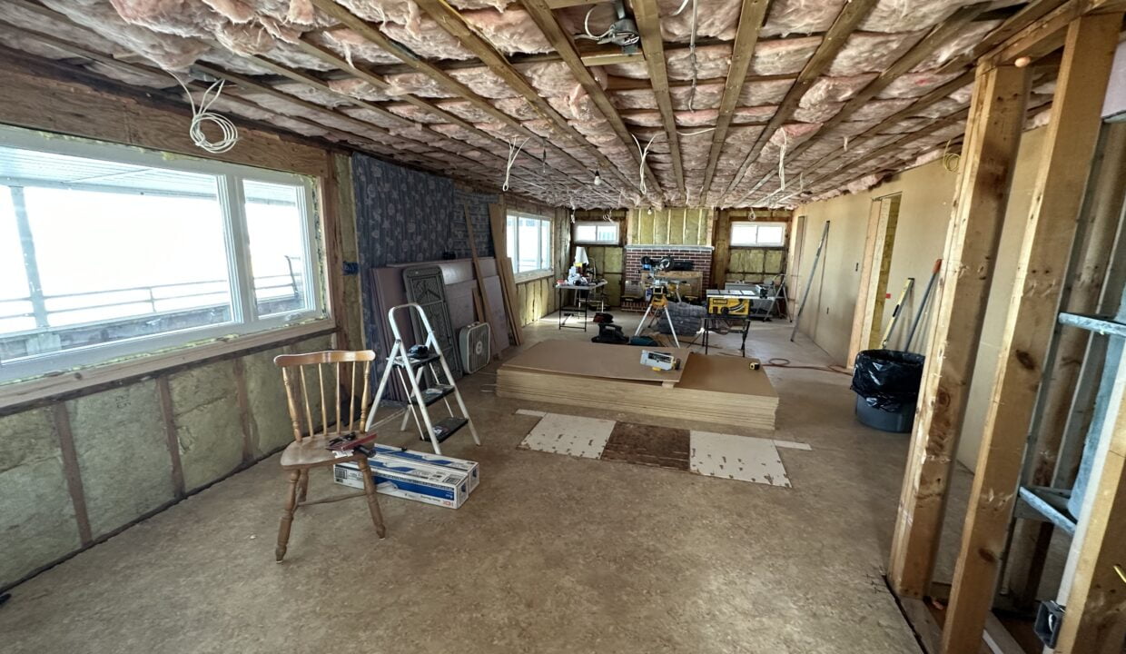 a room that has a lot of wood in it.